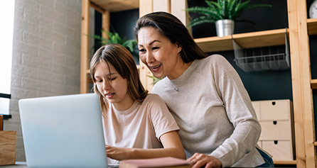 parent and child using computer